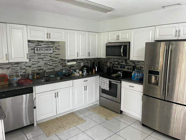 3 bedroom Single Family Residence at 8602 Lakeland Boulevard, Lakewood Park Unit 8B, Fort Pierce — photo 3