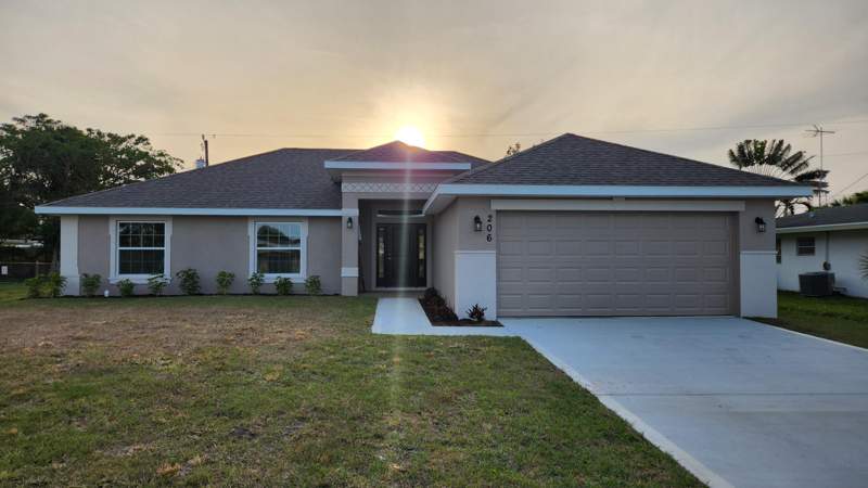 4 bedroom Single Family Residence at 233 SW Becker Road, Port St Lucie Section 34, Port St. Lucie — photo 2