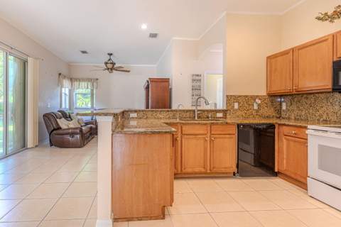 1518 SW Hutchins Street, Port St. Lucie FL - photo 9 of 30