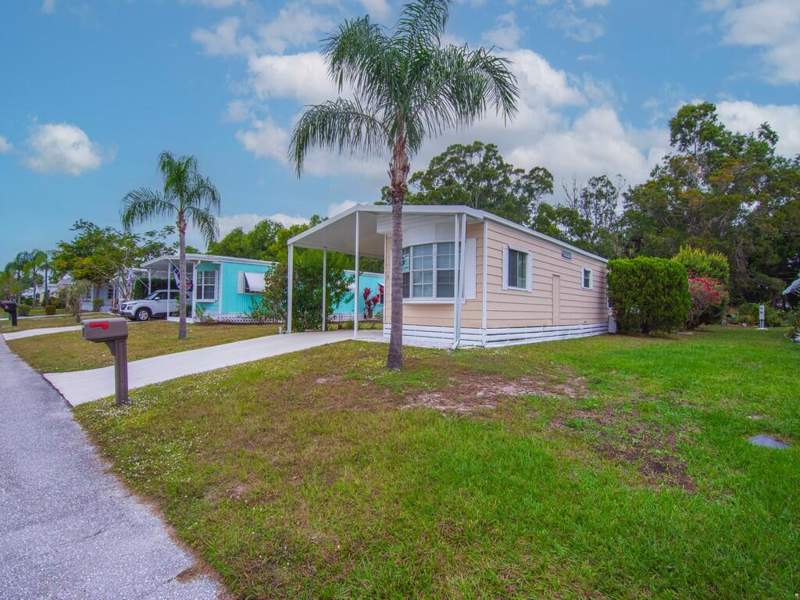 2 bedroom Manufactured Home at 61 E Caribbean, Spanish Lakes Golf Village, Port St. Lucie — photo 2
