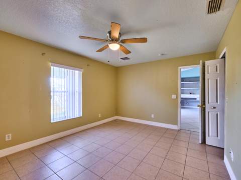 1407 SE Grapeland Avenue, Port St. Lucie FL - photo 10 of 25