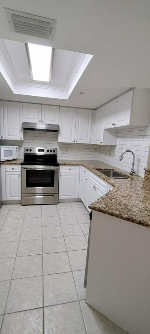 1000 Crestwood Court #1008, Royal Palm Beach FL - photo 6 of 24