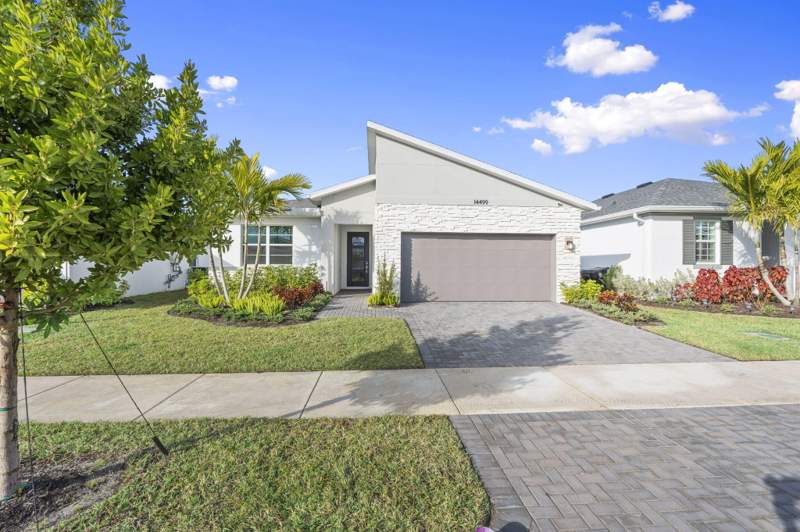 4 bedroom Single Family Residence at 14499 SW Woodford Way, Cadence Phase III, Port St. Lucie — photo 2