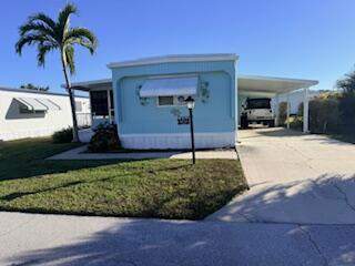 2 bedroom Manufactured Home at 102 N Warner Drive, Pinelake Village, Jensen Beach — photo 3