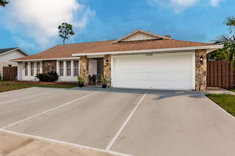 4 bedroom Single Family Residence at 13545 Exotica Lane, Sugar Pond Manor Of Wellington, Wellington — photo 2