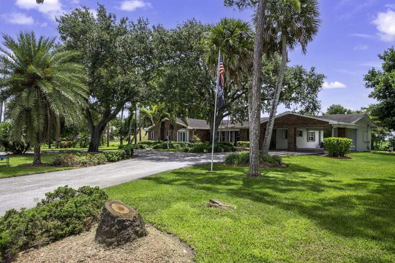 3 bedroom Single Family Residence at 13348 Us Highway 441, Long Beach Colony, Canal Point — photo 2