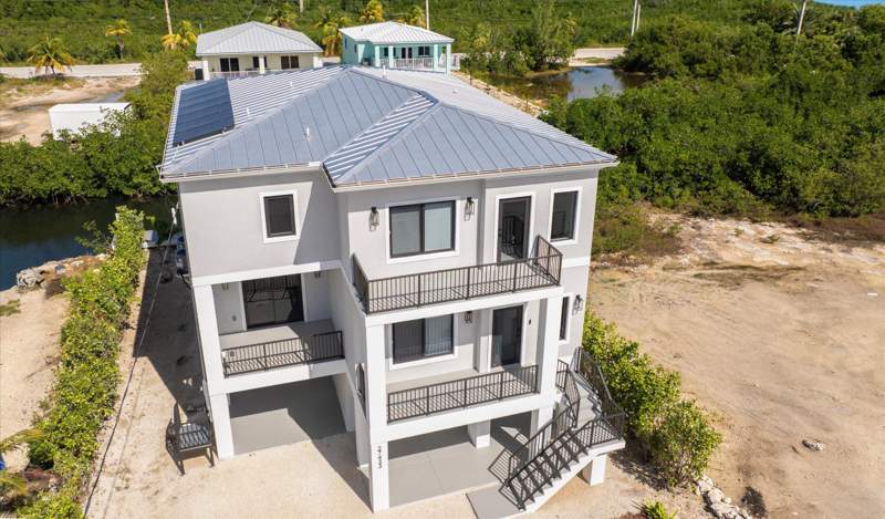 4 bedroom Single Family Residence at 27433 Antigua Lane, Breezeswept Bch Est (27.5), Ramrod Key — photo 5
