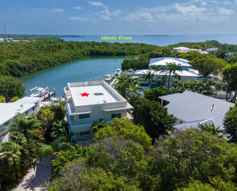 3 bedroom Single Family Residence at 148 Riviera Drive, Fontaine Lake (90.0), Plantation Key — photo 2