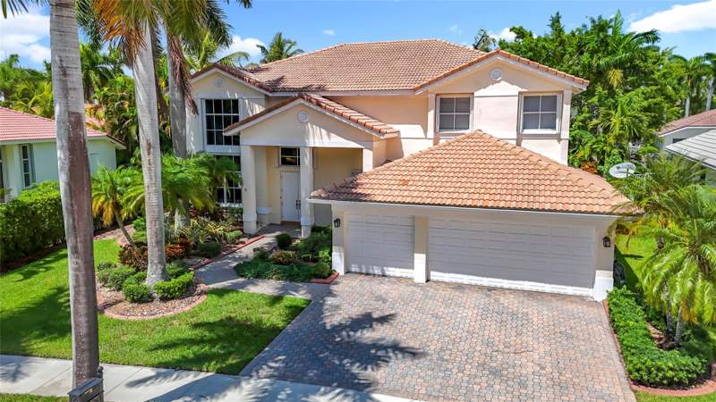 5 bedroom Single Family Residence at 1673 Victoria Pointe Circle, Sector 7-Parcel W, Weston — photo 4