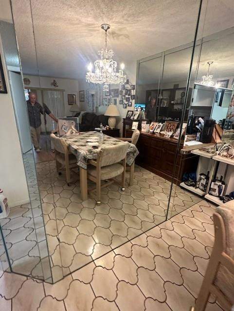 2 bedroom Condominium at 6095 N Sabal Palm Boulevard #109, Lakes of Carriage, Tamarac — photo 4