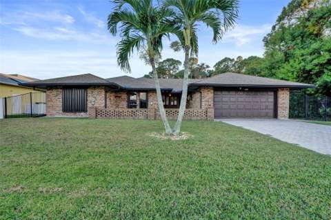 766 SE Cavern Avenue, Port St. Lucie FL - photo 7 of 100