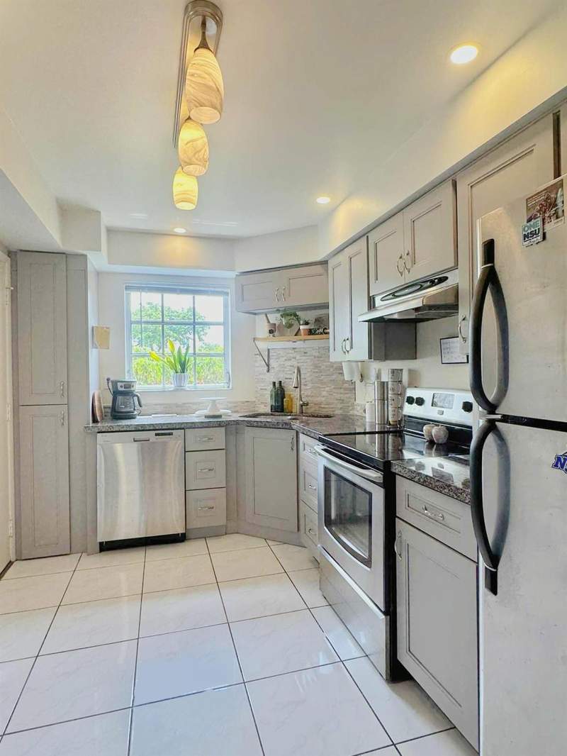 2 bedroom Condominium at 3475 Broken Woods Drive #101, Briarwood Club, Coral Springs — photo 2