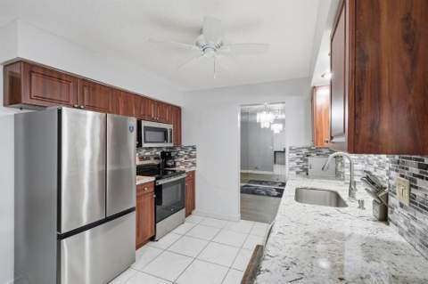 9407 NW 70th Place, Tamarac FL - photo 12 of 47