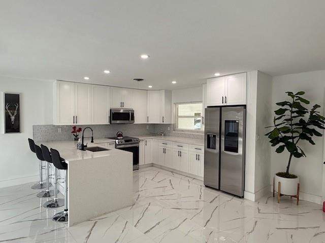 4 bedroom Single Family Residence at 1485 NE 57th Court, Coral Ridge Isles, Fort Lauderdale — photo 5