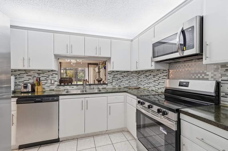 1 bedroom Condominium at 1774 Hammock Boulevard #118, Hammocks-Lake Forest Condo, Coconut Creek — photo 5