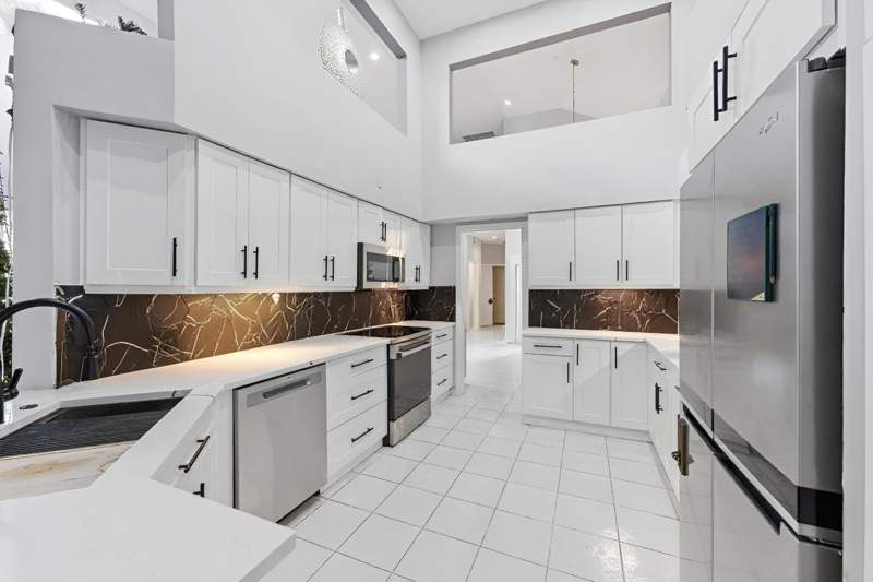 4 bedroom Single Family Residence at 2495 NW 66th Drive, Banyans Of Arvida Country Club, Boca Raton — photo 3