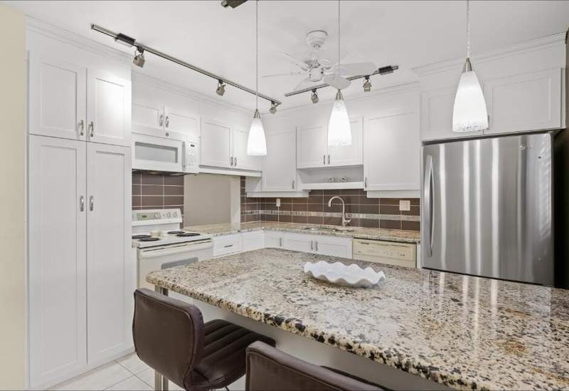 2 bedroom Condominium at 6095 N Sabal Palm Boulevard #210, Lakes Of Carriage Hills, Tamarac — photo 2