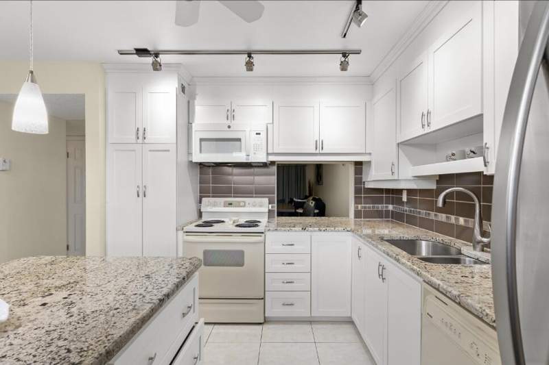 2 bedroom Condominium at 6095 N Sabal Palm Boulevard #210, Lakes Of Carriage Hills, Tamarac — photo 3