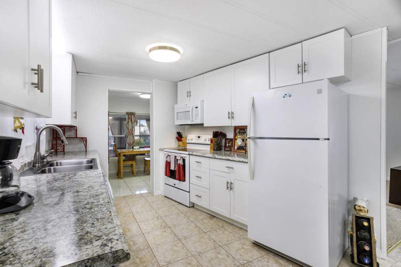 3 bedroom Manufactured Home at 37026 Exuma Bay, Jamaica Bay Mobile Home Co Op, Boynton Beach — photo 4
