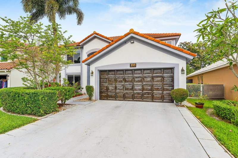 5 bedroom Single Family Residence at 143 St Michaels Court, Stonebriar At Maplewood, Jupiter — photo 2