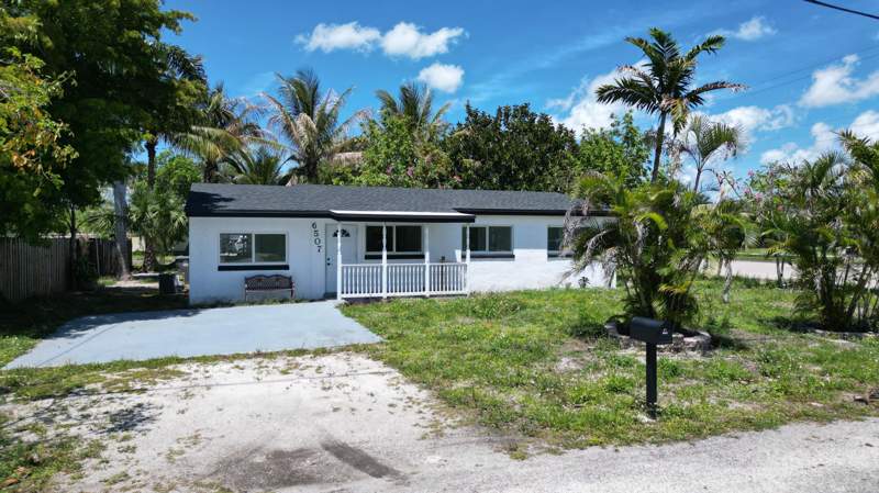 4 bedroom Single Family Residence at 6507 Alexander Road, Palm Beach Farms Co., West Palm Beach — photo 2