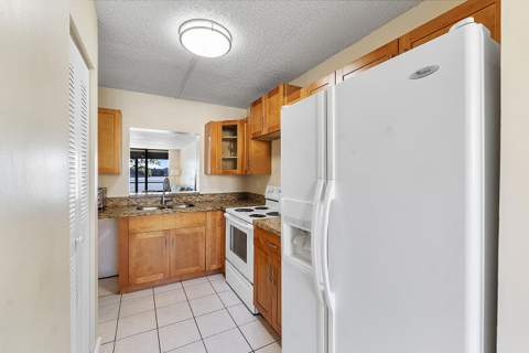3100 NW 46th Street #102, Oakland Park FL - photo 9 of 29