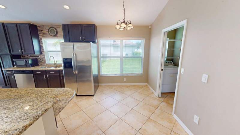 3 bedroom Single Family Residence at 562 SW Saint Martins Cove, Lake Charles Phase 1A, Port St. Lucie — photo 4