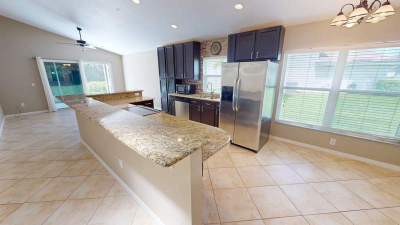 3 bedroom Single Family Residence at 562 SW Saint Martins Cove, Lake Charles Phase 1A, Port St. Lucie — photo 2