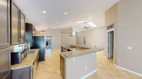 562 SW Saint Martins Cove, Port St. Lucie FL - photo 10 of 99