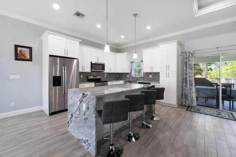 4 bedroom Single Family Residence at 981 SW California Boulevard, Port St Lucie Section 8, Port St. Lucie — photo 5