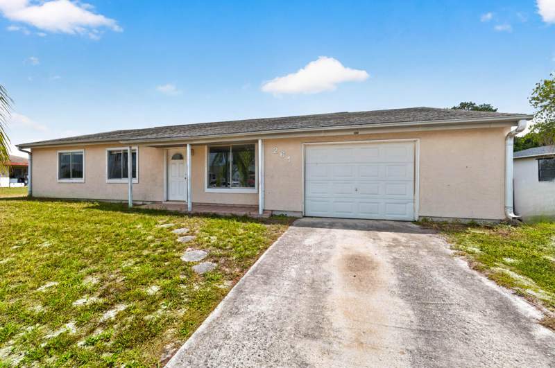3 bedroom Single Family Residence at 261 SW Cherryhill Road, Port St Lucie Section 41, Port St. Lucie — photo 2