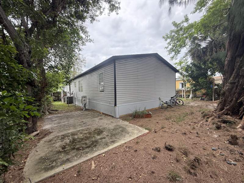 4 bedroom Mobile Home at 10548 W Sandalfoot Blvd W, WATERGATE MOBILE HOME, Watergate — photo 2