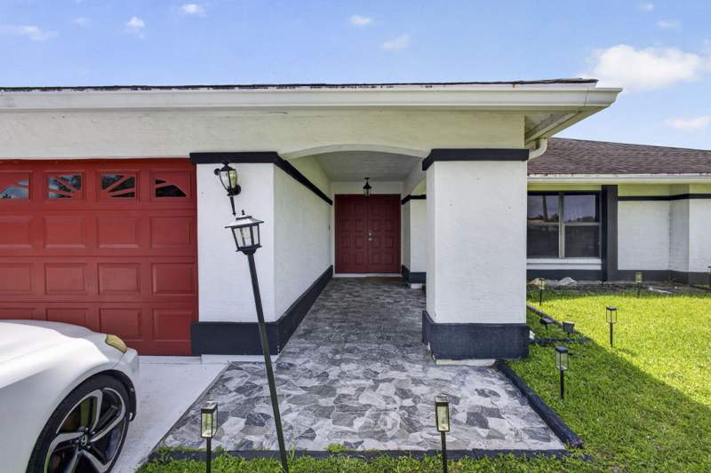 4 bedroom Single Family Residence at 106 Segovia Court, La Mancha 2, Royal Palm Beach — photo 3