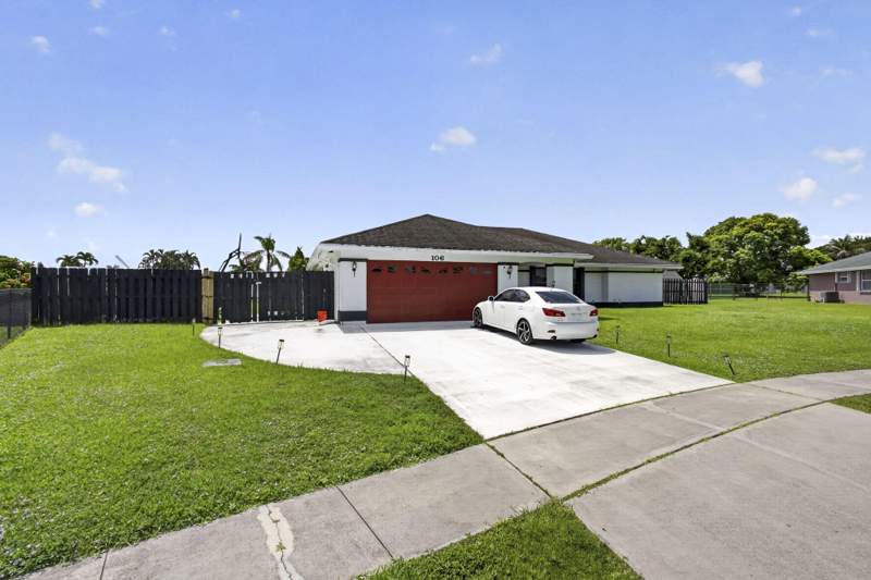 4 bedroom Single Family Residence at 106 Segovia Court, La Mancha 2, Royal Palm Beach — photo 2