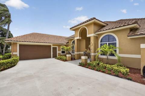 8030 Woodsmuir Drive, Palm Beach Gardens FL - photo 10 of 80