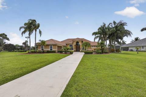 8030 Woodsmuir Drive, Palm Beach Gardens FL - photo 8 of 80