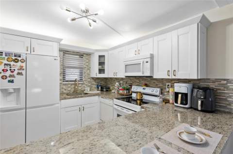 9300 SW 8th Street #102, Boca Raton FL - photo 6 of 23