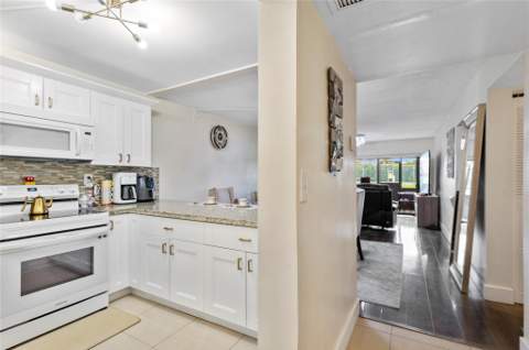 9300 SW 8th Street #102, Boca Raton FL - photo 7 of 23