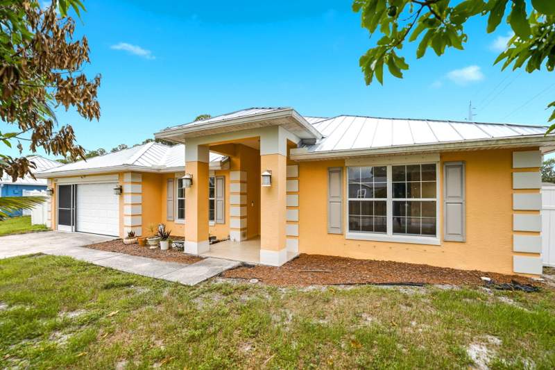 4 bedroom Single Family Residence at 1692 SW Lofgren Avenue, Port St Lucie Section 19, Port St. Lucie — photo 3
