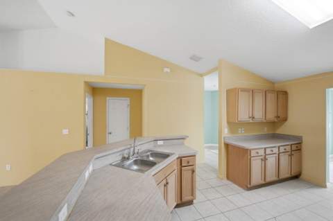 1692 SW Lofgren Avenue, Port St. Lucie FL - photo 9 of 59