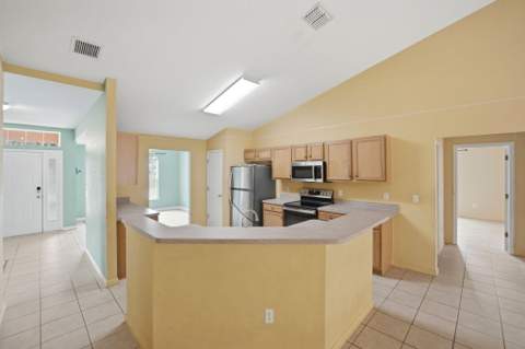 1692 SW Lofgren Avenue, Port St. Lucie FL - photo 11 of 59