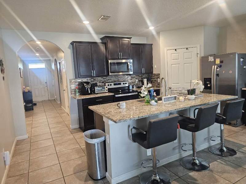 4 bedroom Single Family Residence at 5015 NW North Macedo Boulevard, Port St Lucie Section 43, Port St. Lucie — photo 4