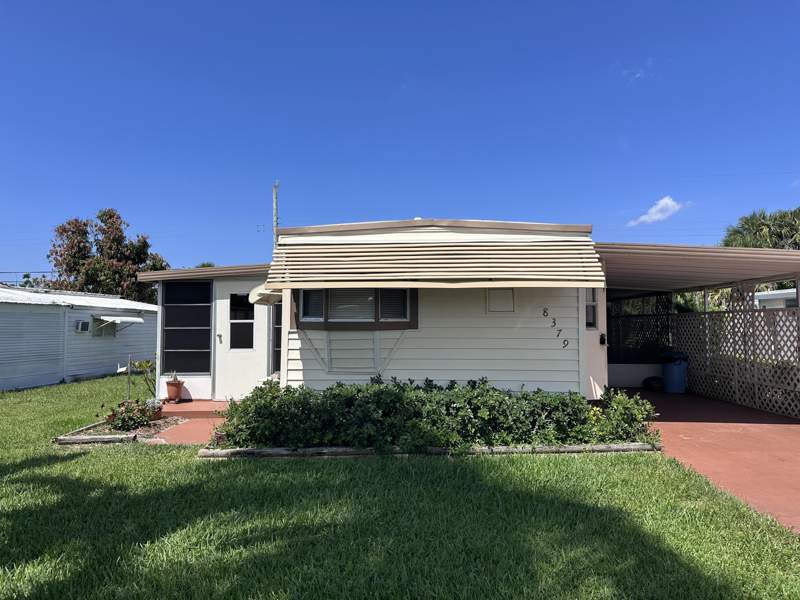 2 bedroom Manufactured Home at 8379 SE Eagle Avenue, Ridgeway, Hobe Sound — photo 4