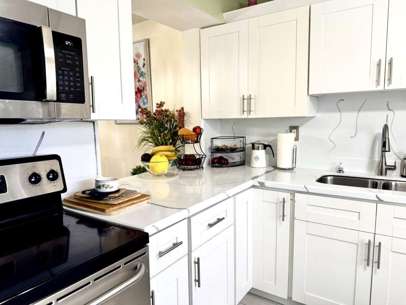 2 bedroom Condominium at 4930 E Sabal Palm Boulevard #107, Lakes Of Carriage Hills, Tamarac — photo 4