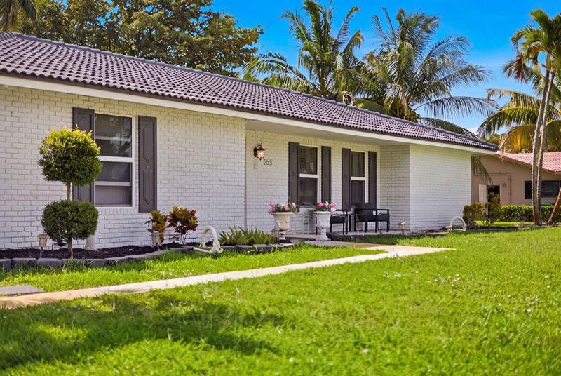 4 bedroom Single Family Residence at 2651 NW 107th Avenue, Coral Springs Country Club, Coral Springs — photo 2