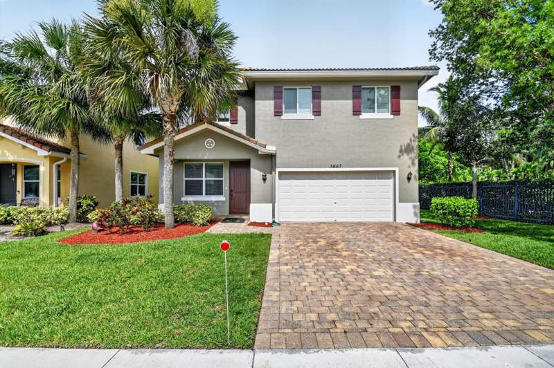 5 bedroom Single Family Residence at 5667 Caranday Palm Drive, VERONA ESTATES, Greenacres — photo 1