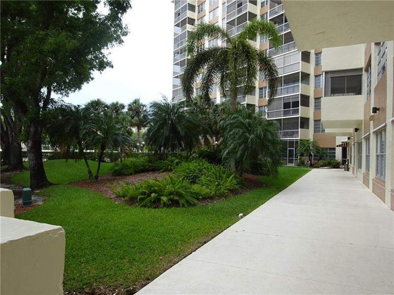 1 bedroom Condominium at 10777 W Sample Road #1104, Country Club Tower Of Coral, Coral Springs — photo 4