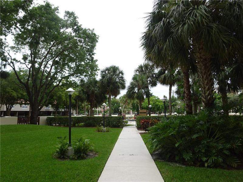 1 bedroom Condominium at 10777 W Sample Road #1104, Country Club Tower Of Coral, Coral Springs — photo 5