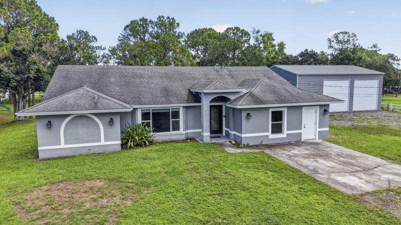 4 bedroom Single Family Residence at 14935 89th Place, The Acreage, Loxahatchee — photo 3