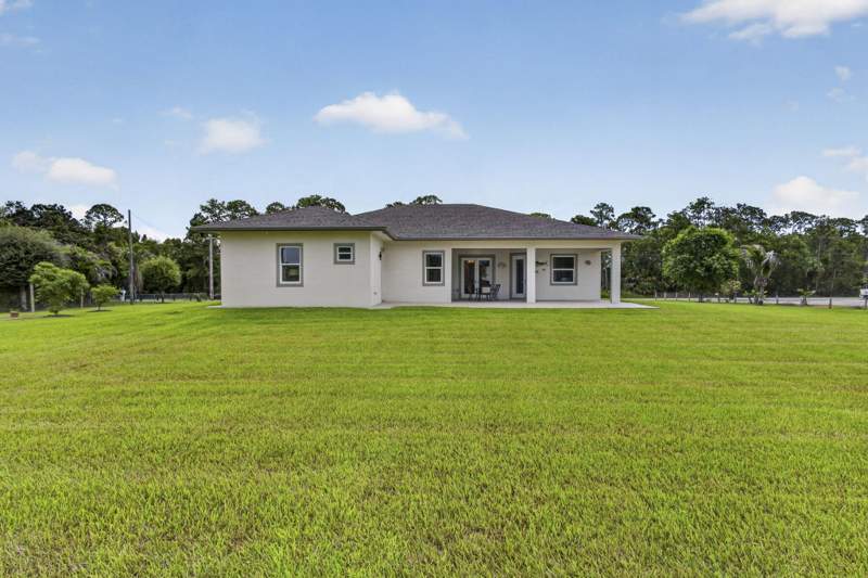 4 bedroom Single Family Residence at 15108 99th Street, 18-42-41~ N 269 Ft Of S 4622.55 Ft Of W 209 Ft , The Acreage — photo 4